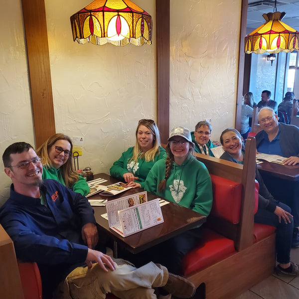 Family and friends getting pizza after a long day at an Event