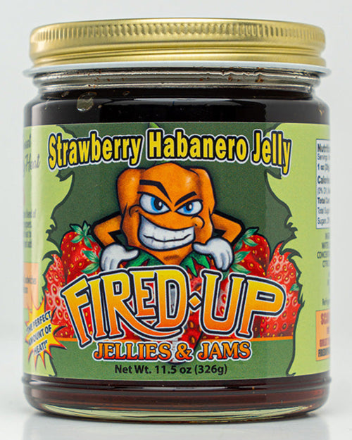 A jar of Strawberry Habanero Jelly with a label featuring Pep the Habanero with a Strawberry zip-up suit and images of strawberries.